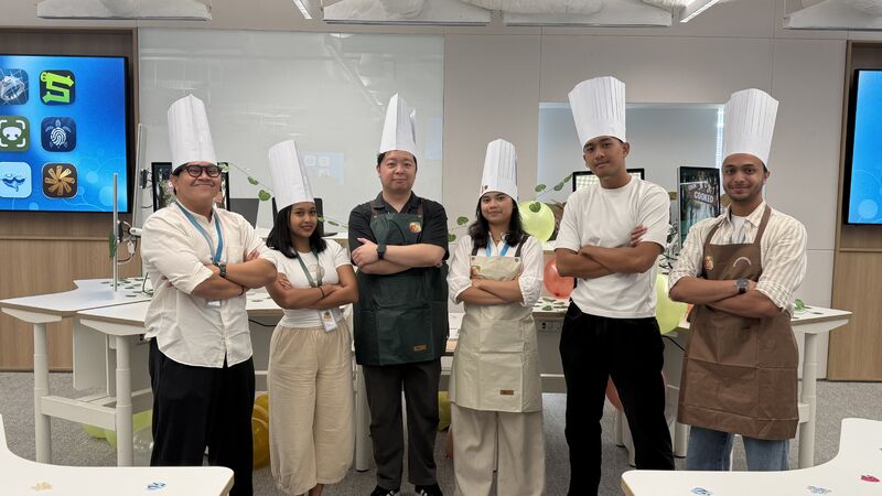 Cook or Cooked development team dressed as chefs
